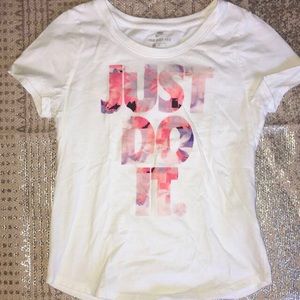 Nike t-shit. Just do it in floral design. Size M